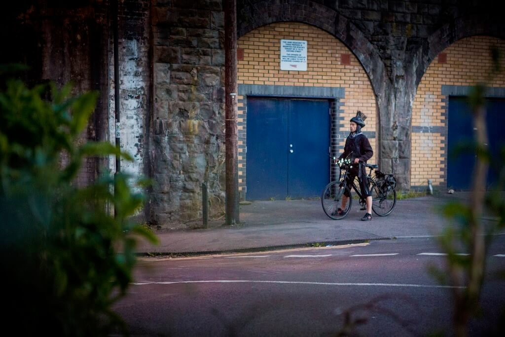 A cyclist is poised for adventure.