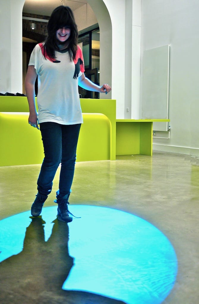 Big smiles are always present when people play with Tine's interactive light work.