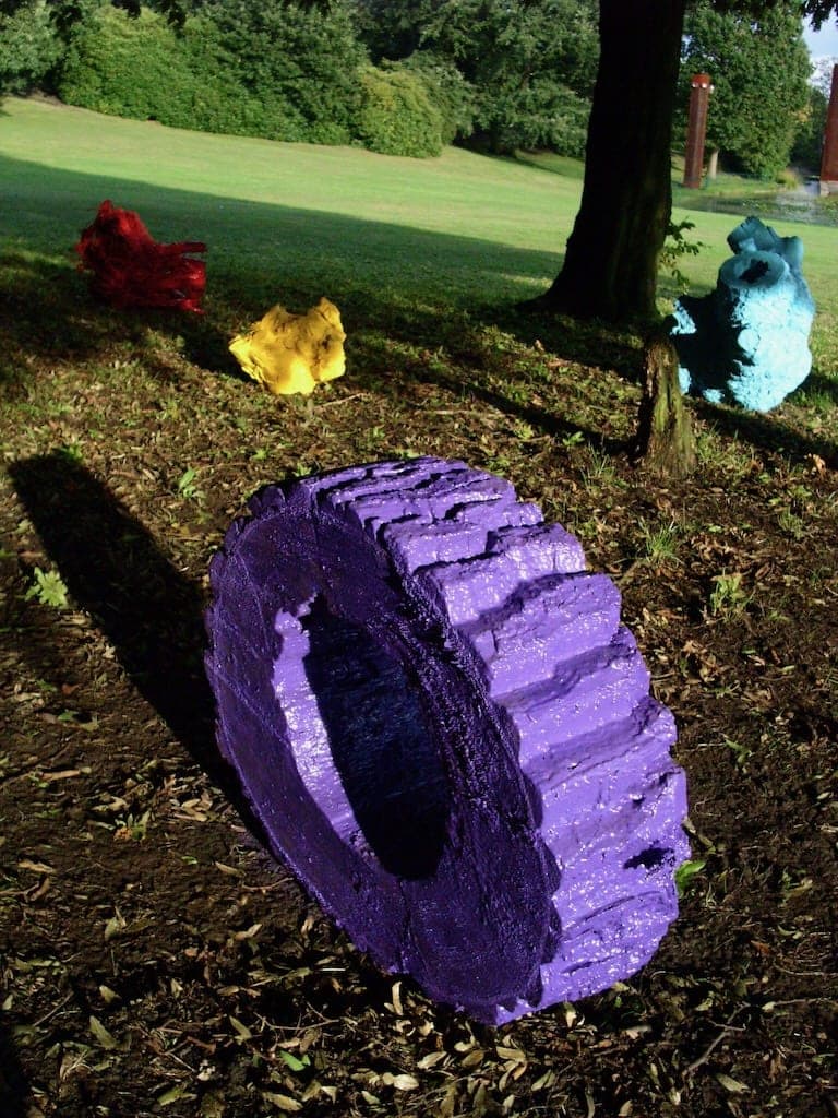 Repurposed dead tree roots were given new life in a vibrant shade of purple.