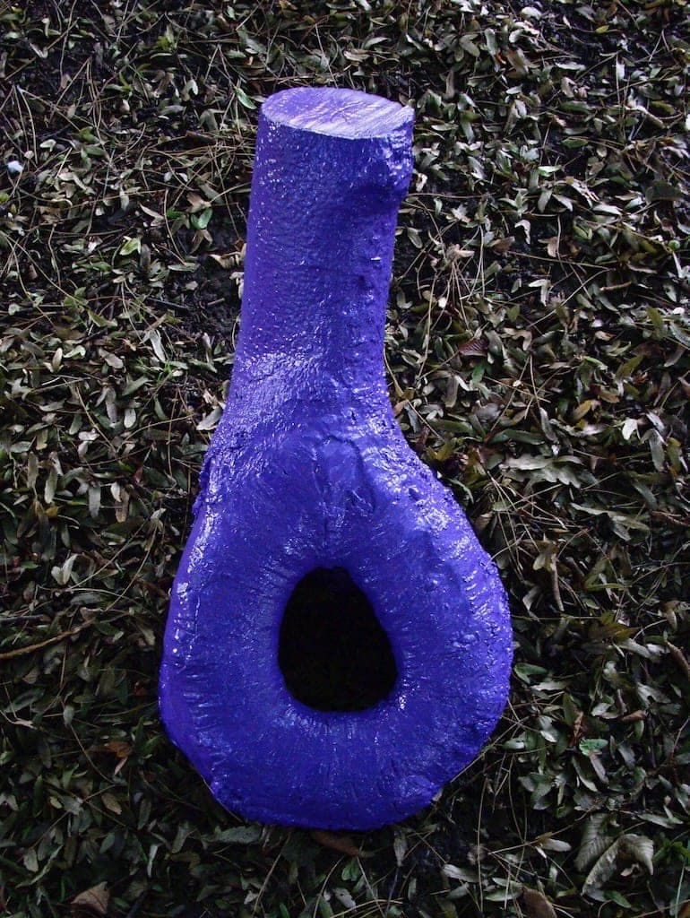 Repurposed dead tree roots were given new life in a vibrant shade of purple.