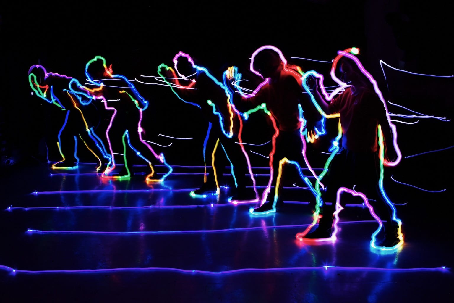Children created innovative light drawings inspired by Olympic events.