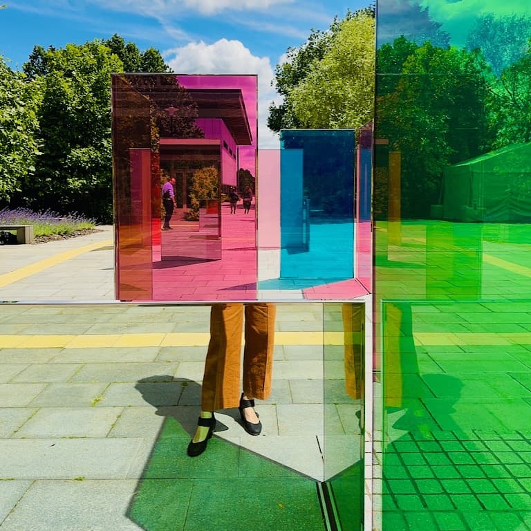 Tine marries glass and mirrors to create a mind bending walk through experience.