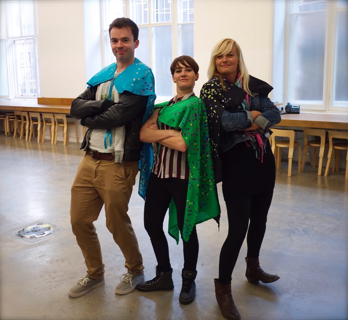 Posing in coloured capes, workshop participants have fun exploring movement and sound.